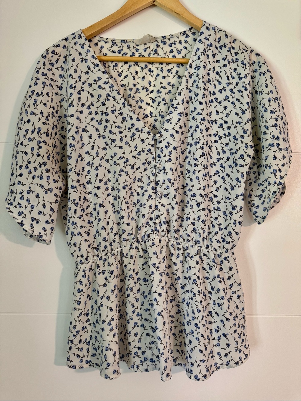 Sienna Sky Women's Cream Floral V-Neck Peplum Top